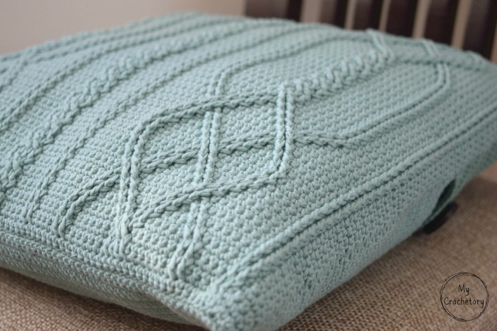 Cable Diamond Pillow - cable crochet free pattern by www.mycrochetory.com Detailed view of crochet cable pattern on the pillow cover