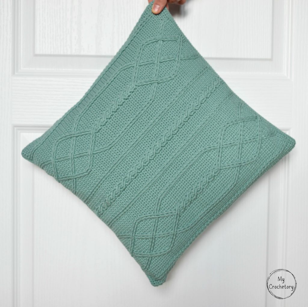 Cable Diamond Pillow - cable crochet free pattern by www.mycrochetory.com Detailed view of crochet cable pattern on the pillow cover