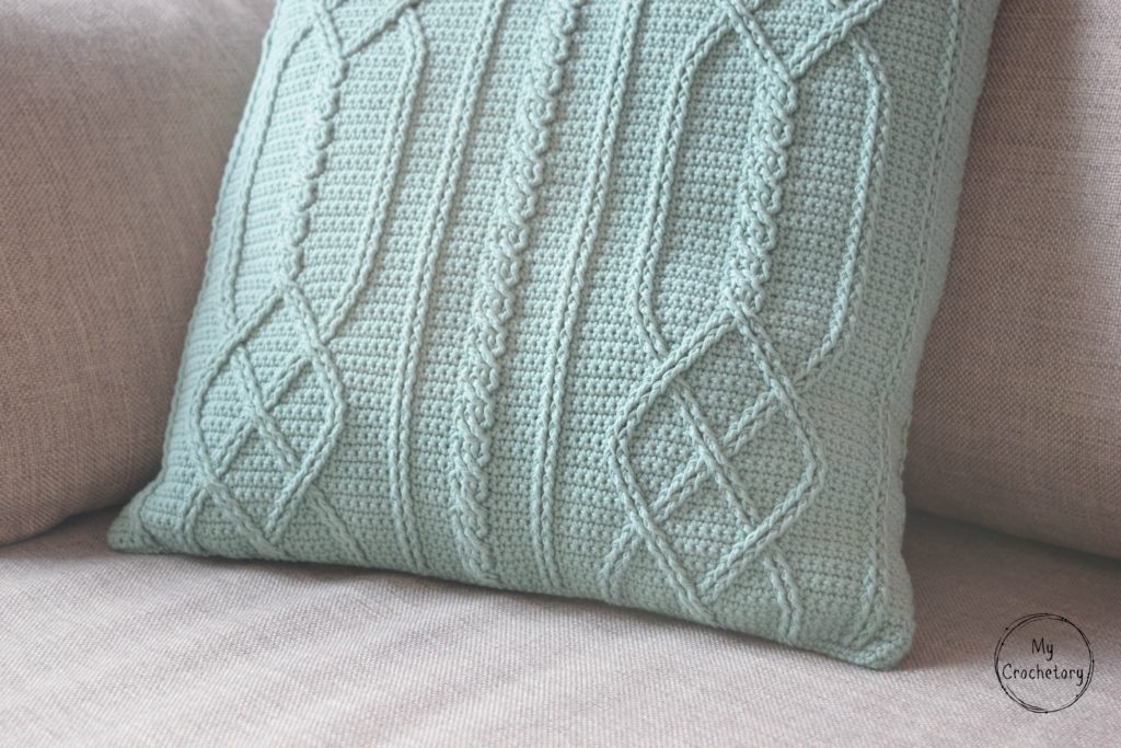 Cable Diamond Pillow - cable crochet free pattern by www.mycrochetory.com Detailed view of crochet cable pattern on the pillow cover