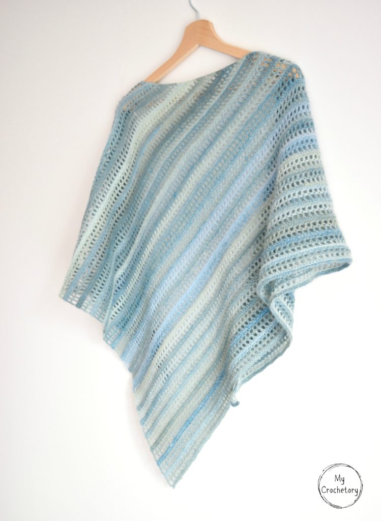 Aprilis Shawl - beginner friendly free crochet pattern by www.mycrochetory.com Aprilis Shawl - A beautiful asymmetrical simple crochet shawl pattern with a modern design, perfect for warmer weather.