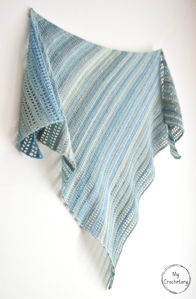 Aprilis Shawl - beginner friendly free crochet pattern by www.mycrochetory.com Aprilis Shawl - A beautiful asymmetrical simple crochet shawl pattern with a modern design, perfect for warmer weather.