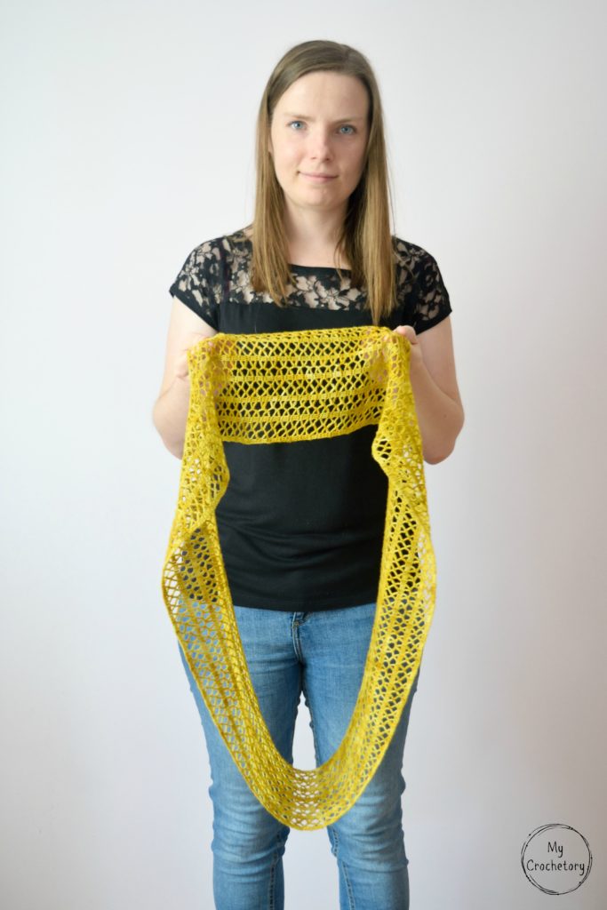 Step-by-step guide to crochet a stunning Sunny lace infinity scarf, featuring a captivating pattern that adds a stylish flair to your wardrobe.