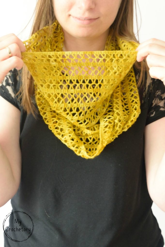 Step-by-step guide to crochet a stunning Sunny lace infinity scarf, featuring a captivating pattern that adds a stylish flair to your wardrobe.
