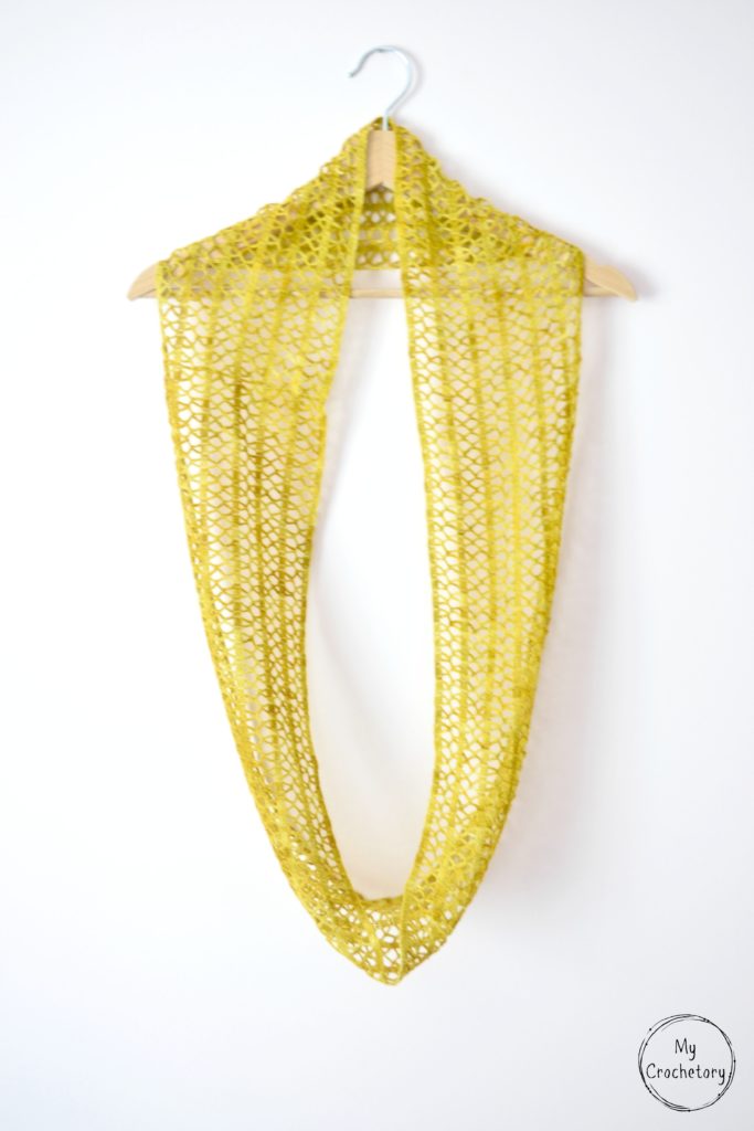 Step-by-step guide to crochet a stunning Sunny lace infinity scarf, featuring a captivating pattern that adds a stylish flair to your wardrobe.