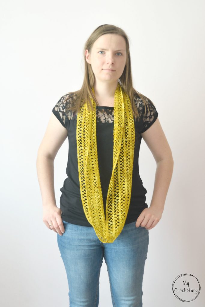 Step-by-step guide to crochet a stunning Sunny lace infinity scarf, featuring a captivating pattern that adds a stylish flair to your wardrobe.