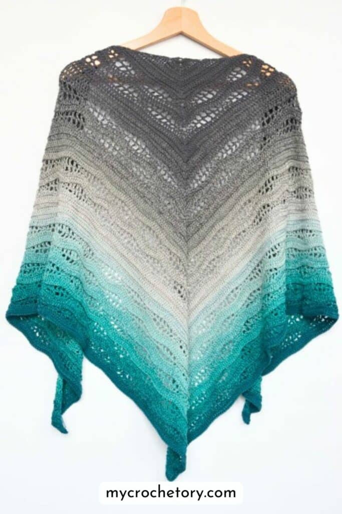 Kalinda Shawl crochet pattern – triangle crochet shawl in grey to teal gradient, wavy lace stitch texture by MyCrochetory.