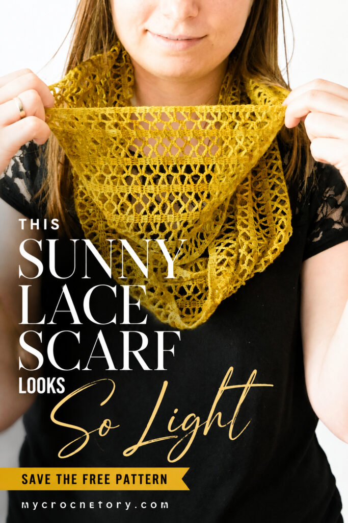 This Sunny Lace scarf looks so light pin with an ochre crochet lace cowl held open over a black top, save the free pattern