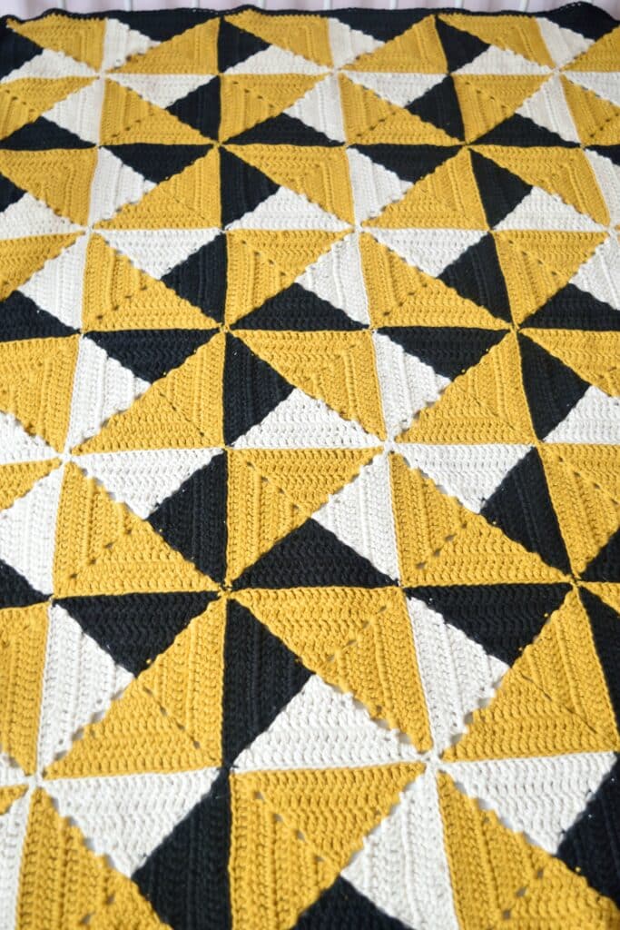 Crochet granny squares neatly joined with mattress stitch creating smooth invisible seams