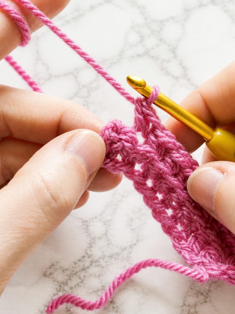 Back loop single crochet ribbing tutorial with the second row almost completed