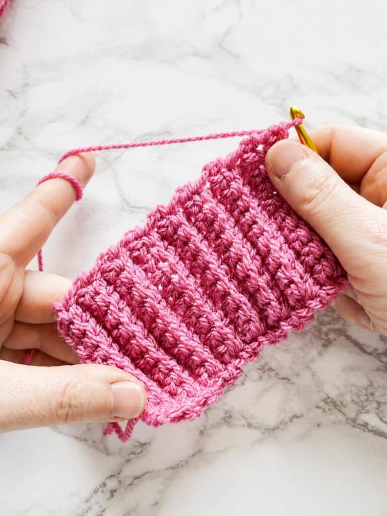 Back loop single crochet ribbing swatch with classic stretchy crochet texture and defined vertical ridges