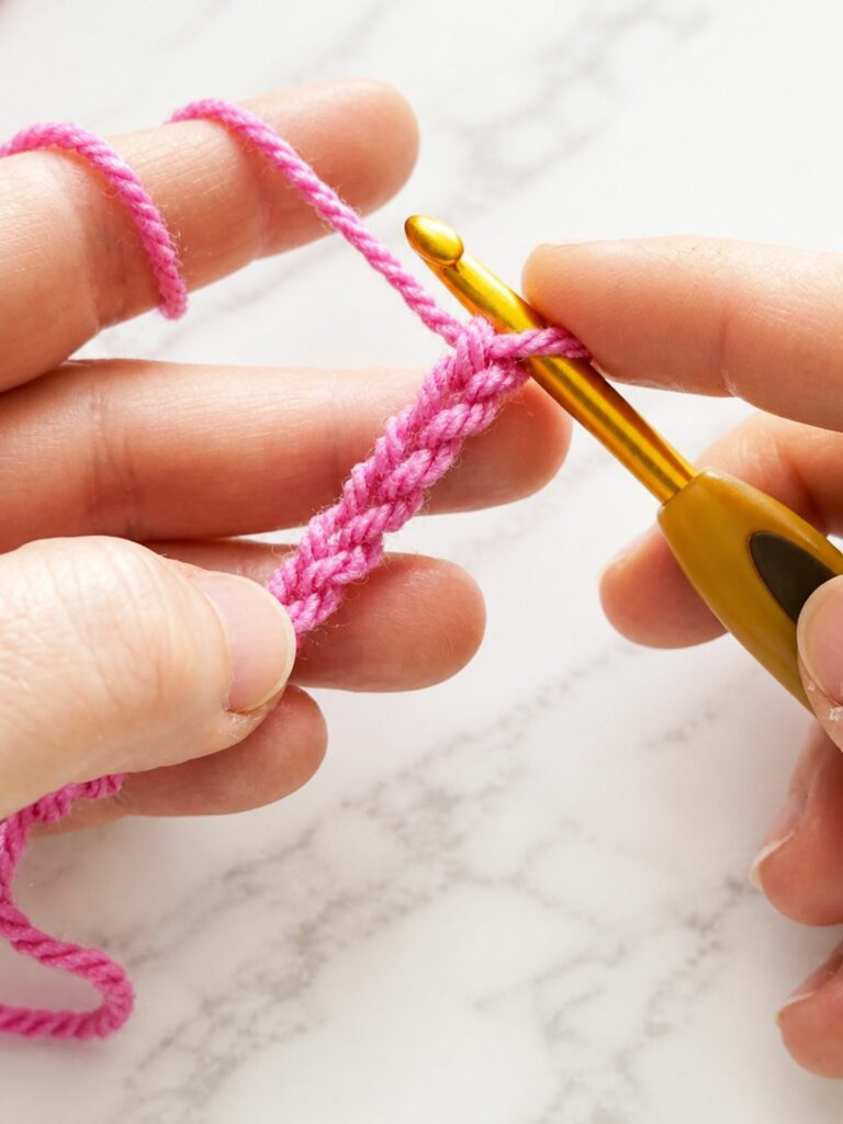 Starting chain at the beginning of a new row in yarn over slip stitch crochet ribbing tutorial