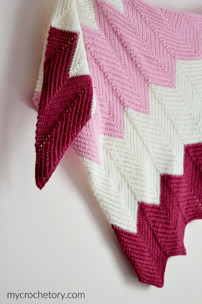 A beautiful ZygZak ripple crochet shawl pattern FREE with an asymmetrical design.