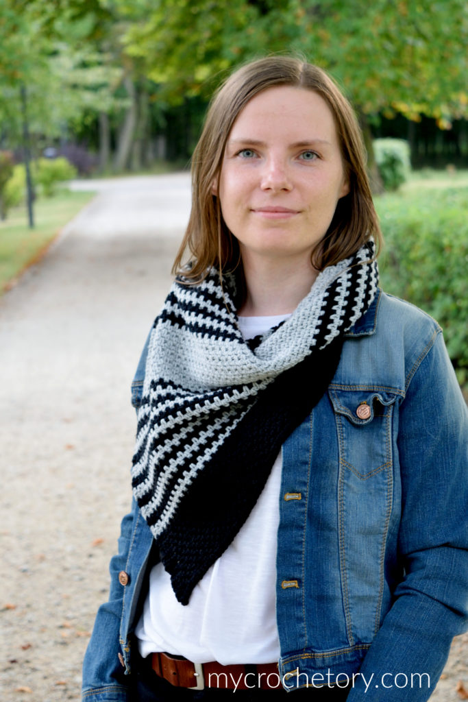 A person wearing the Free Greus Crochet Cowl Pattern in an outdoor setting, demonstrating its functionality and warmth.