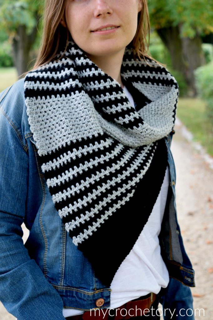 A person wearing the Free Greus Crochet Cowl Pattern in an outdoor setting, demonstrating its functionality and warmth.