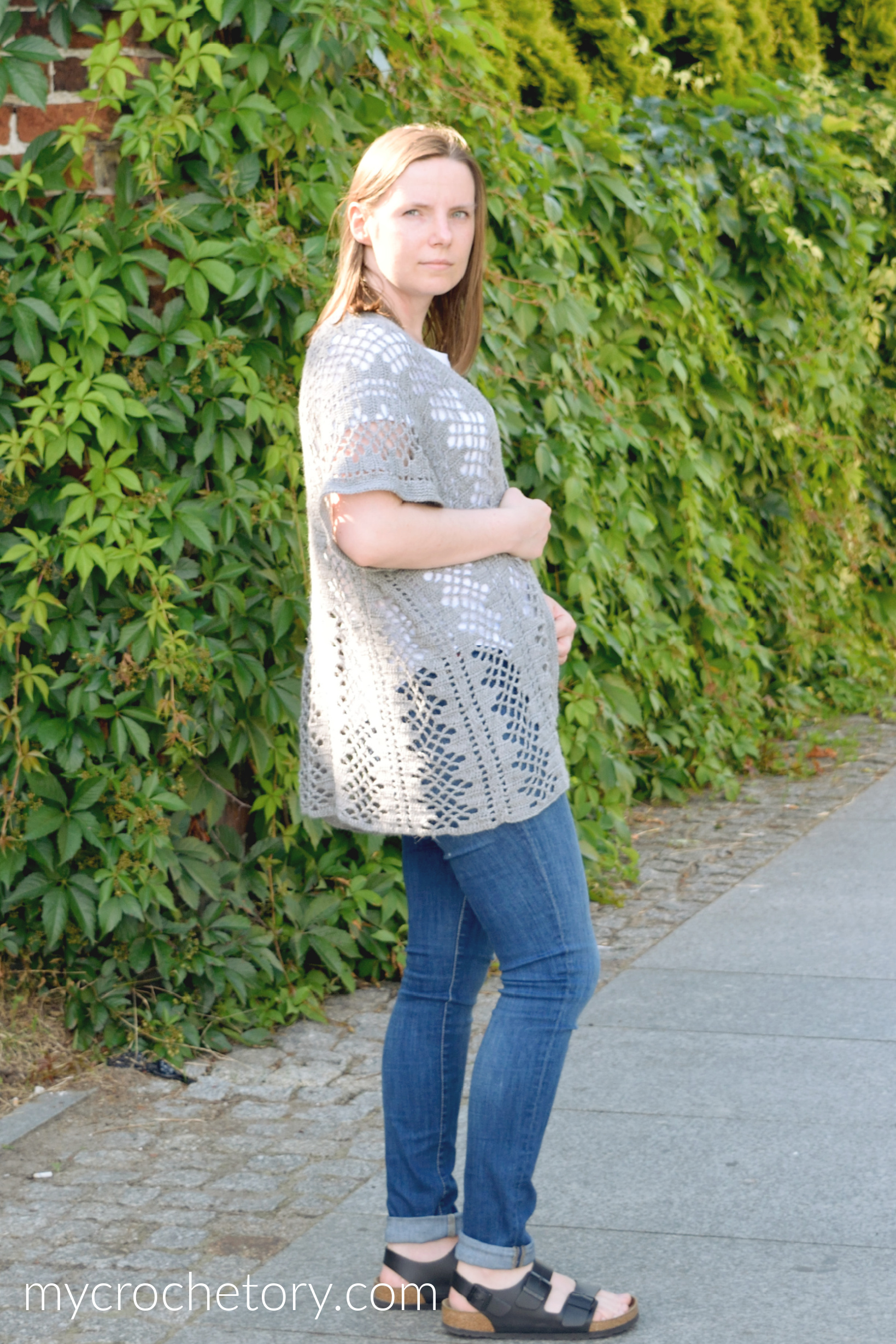 Gray Nusa lightweight crochet cardigan worn with a white T-shirt and jeans