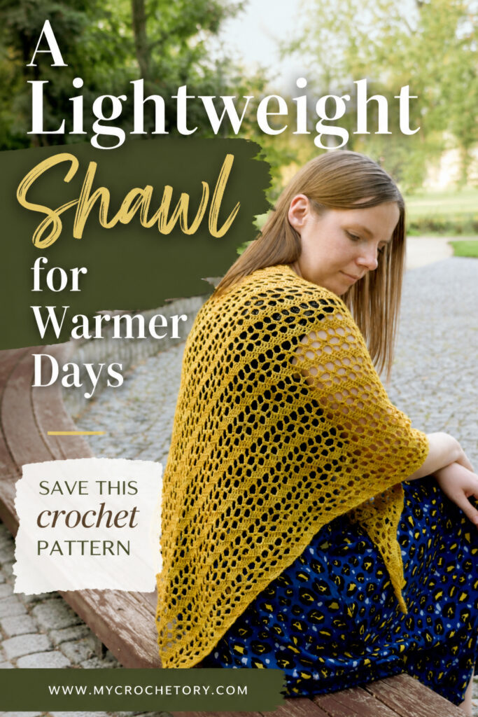 A lightweight shawl for warmer days pin with a mustard lace triangle shawl worn on a park bench