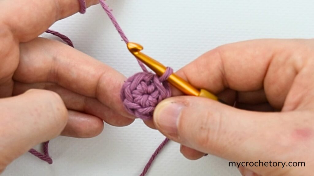 A finished crochet magic circle showing neat stitches, great for learning how do I crochet magic circle.
