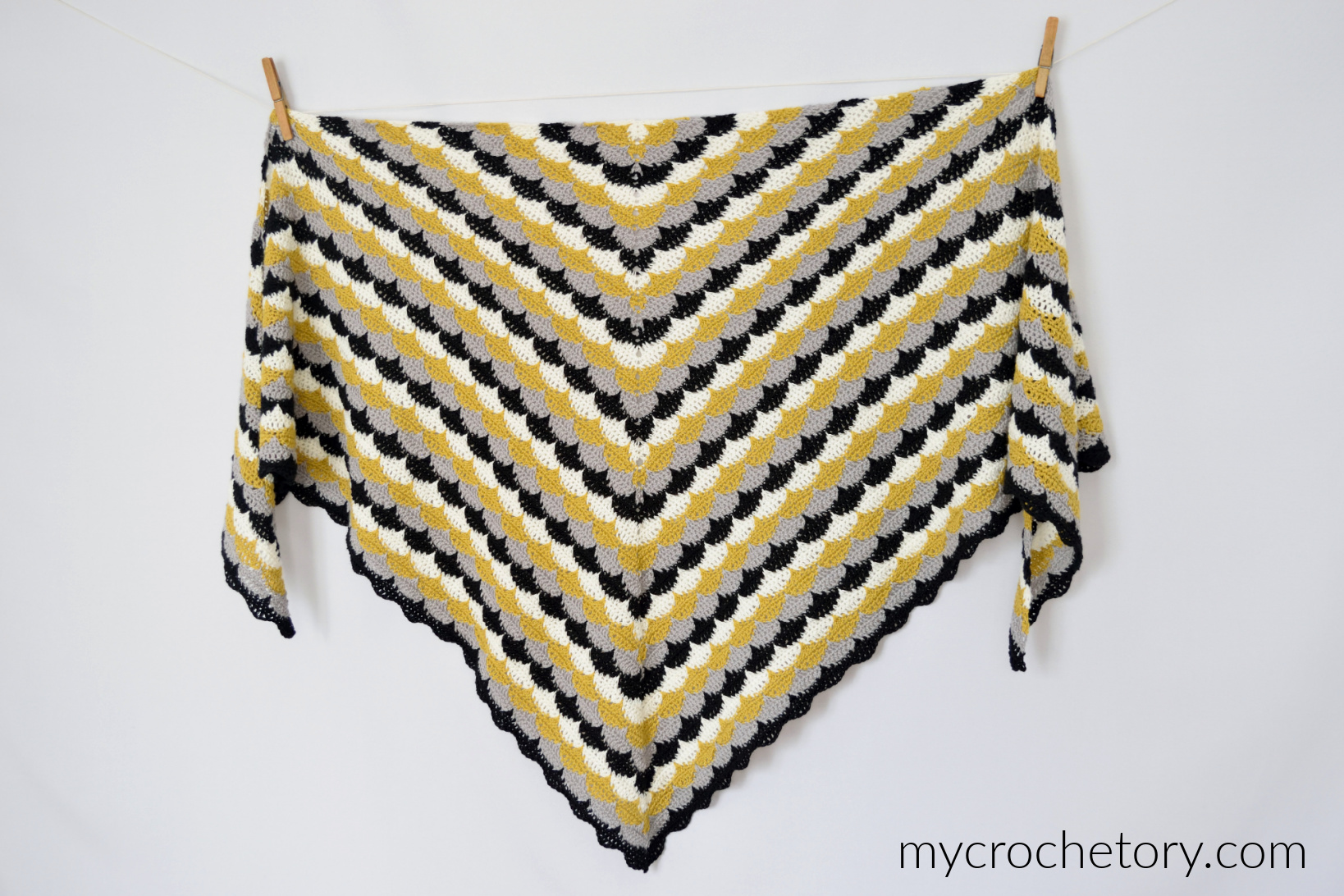 Clamshell Shawl in mustard, gray, black and cream, made with the clamshell crochet stitch