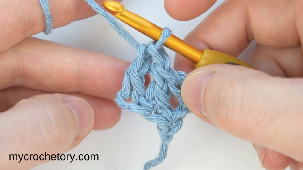 Two foundation double crochet stitches side by side on a chainless foundation | free crochet tutorials for beginners