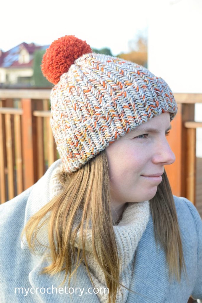 Side view of crochet winter hat pattern being worn