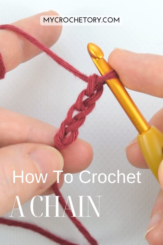 Learn how to crochet a chain – hands holding finished chains. Perfect beginner crochet tutorial!
