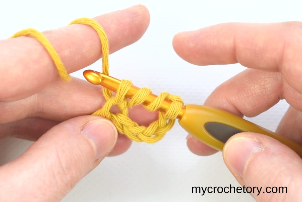 How to treble crochet: comleting treble crochet stitch .