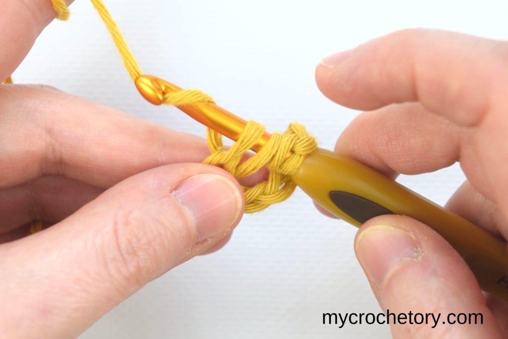 How to treble crochet: three loops on the hook.