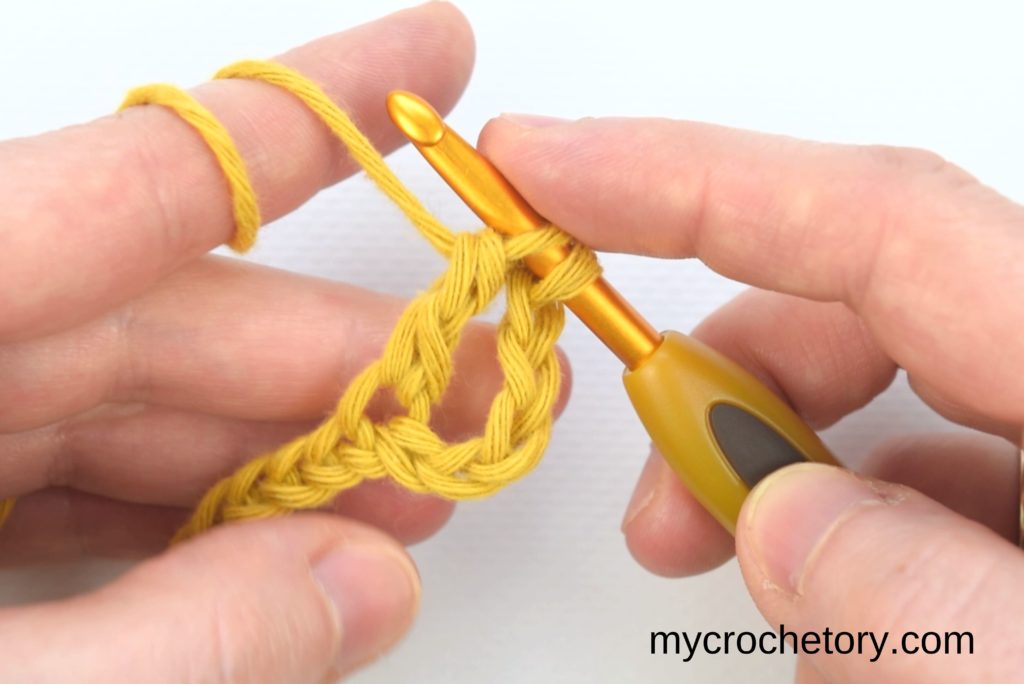 How to treble crochet:two loops left on the hook.