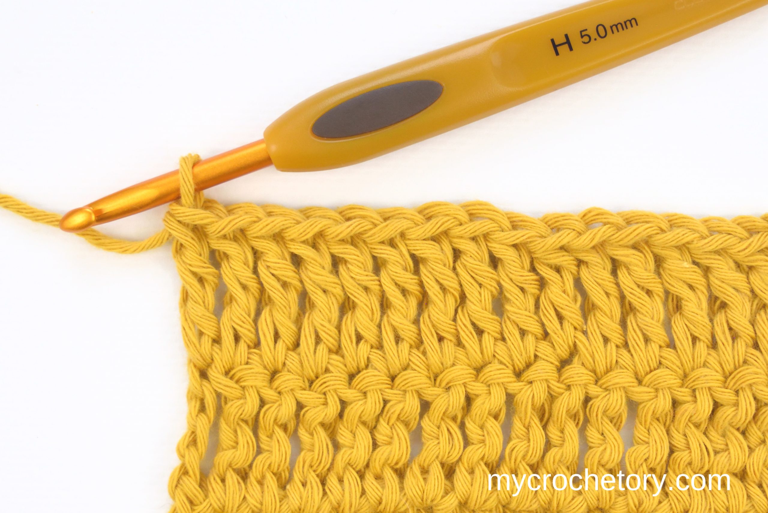 Yellow treble crochet swatch with a 5 mm crochet hook