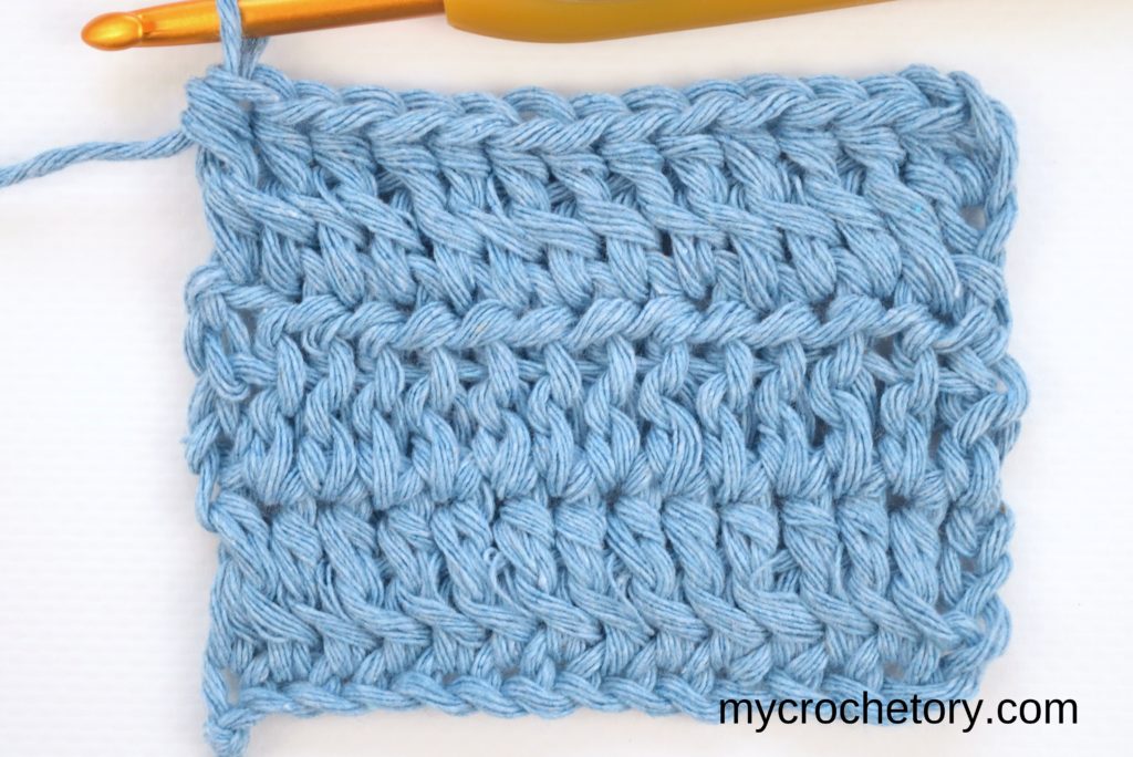 A crocheted swatch showcasing the neat and even result achieved by crocheting two rows of half double crochet simultaneously.