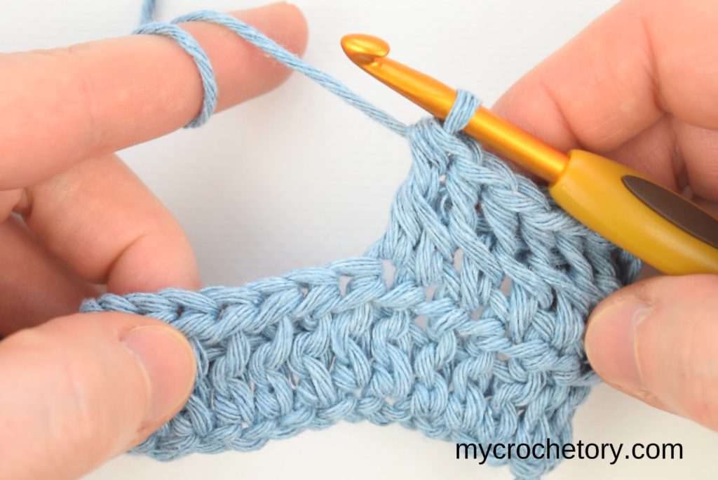 A work-in-progress image capturing the steps of crocheting two rows at once, highlighting the simplicity of the technique.