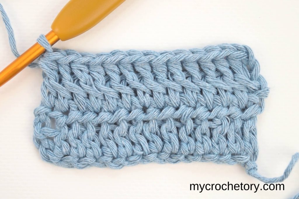 How to half double crochet 2 rows at once: 4 rows completed.