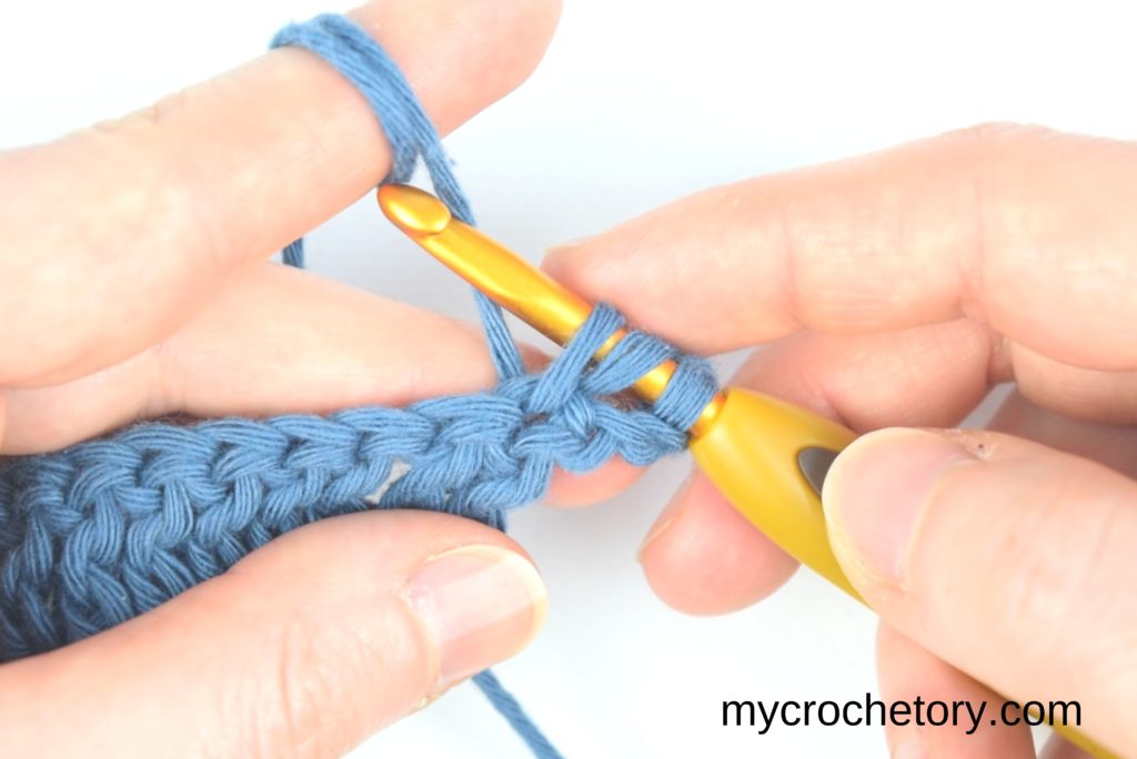 How to double crochet for beginners: completing the first double crochet.
