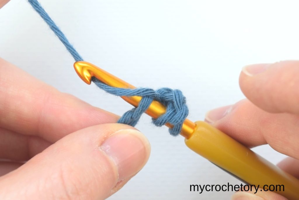 How to double crochet for beginners: yarning over.
