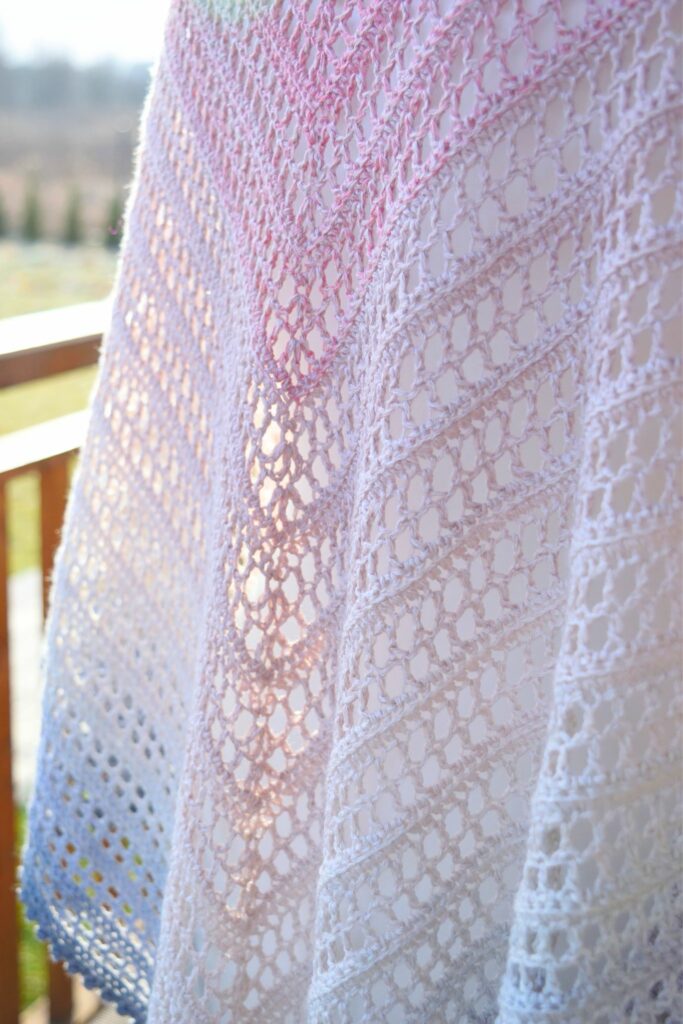Close-up of the intricate stitches in the Aprilace Free Crochet Shawl.