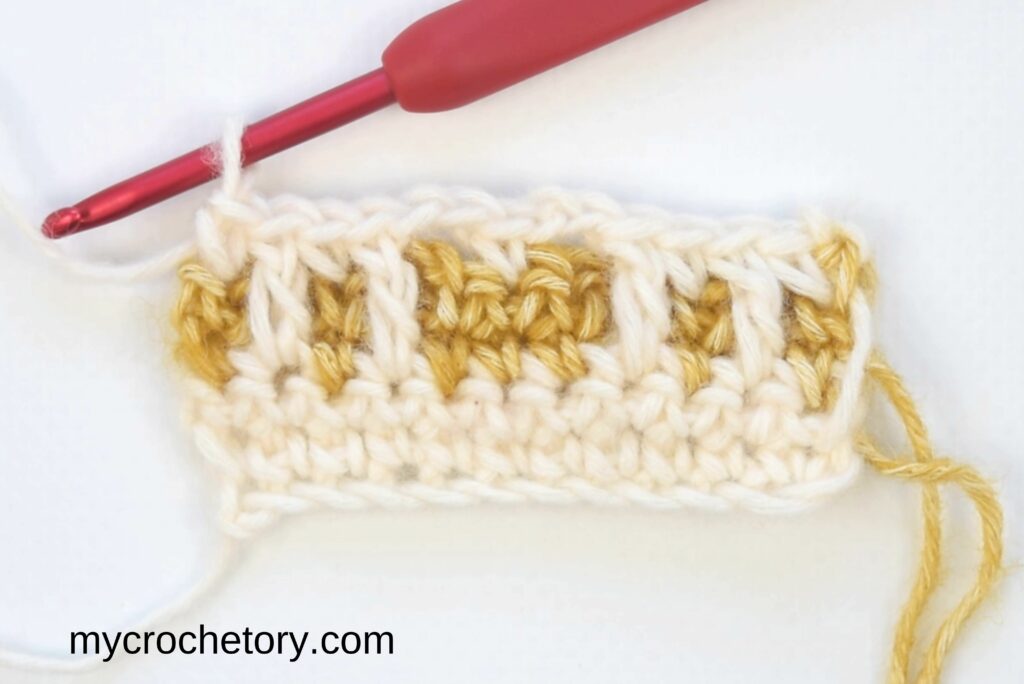 Mosaic crochet in rows: fifth row on right side with special mosaic double crochet stitches