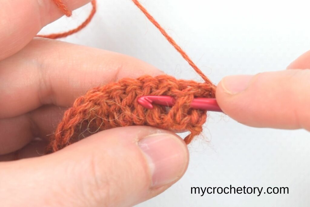 How to Crochet Basketweave Stitch: Row 2 first front post double crochet in progress.