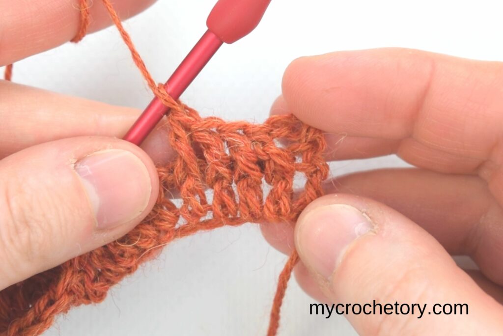 How to Crochet Basketweave Stitch: Row 2 - 4 front post double crochet stitches completed.
