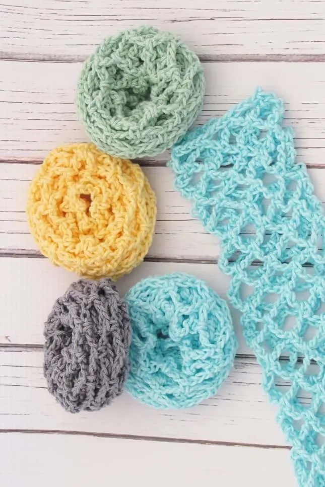 Crochet Scrubbie Free Pattern (Unroll to Clean) - unrolled scrubby for easy washing, featured in scrubby yarn crochet patterns.