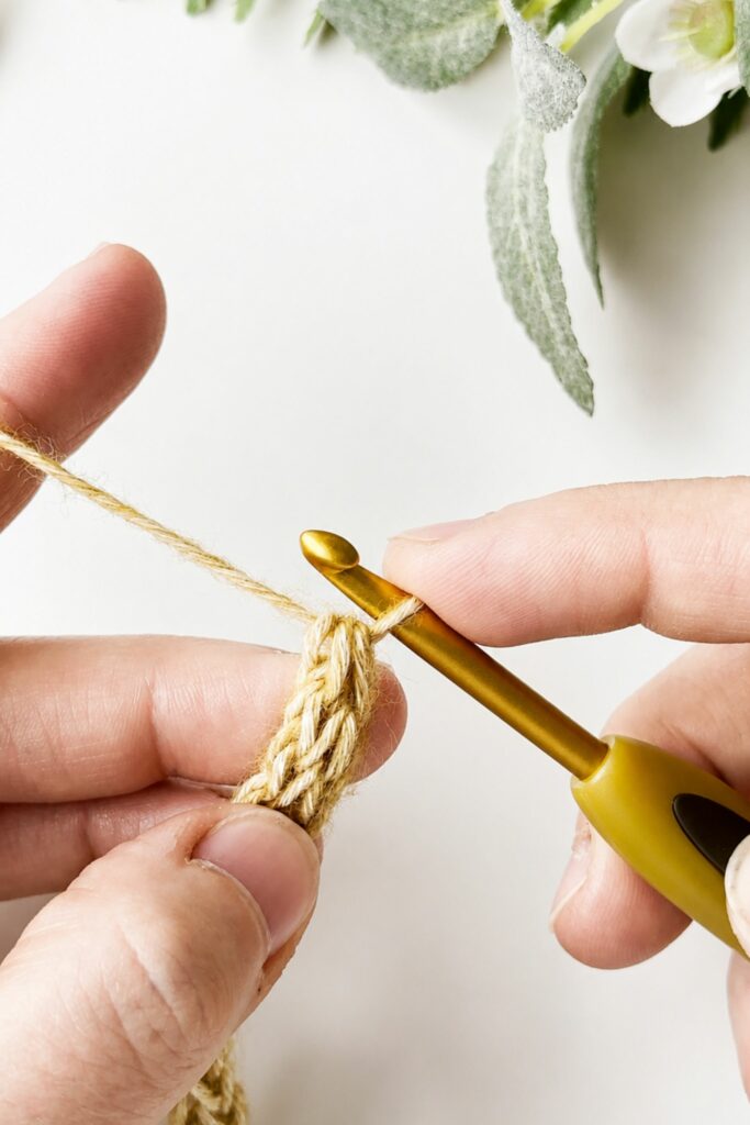 Finishing a crochet I-Cord by pulling yarn through the remaining loops