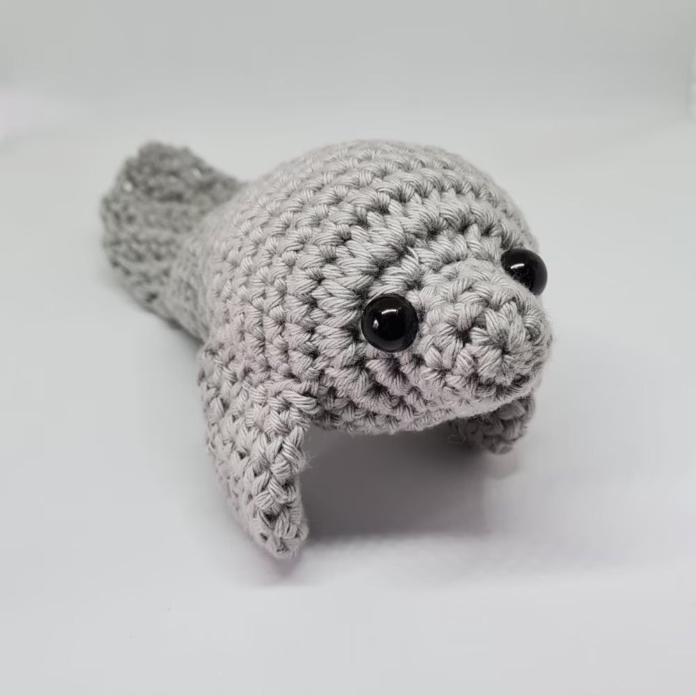 Adorable chubby crochet manatee. This crochet animal pattern free is fun and rewarding.