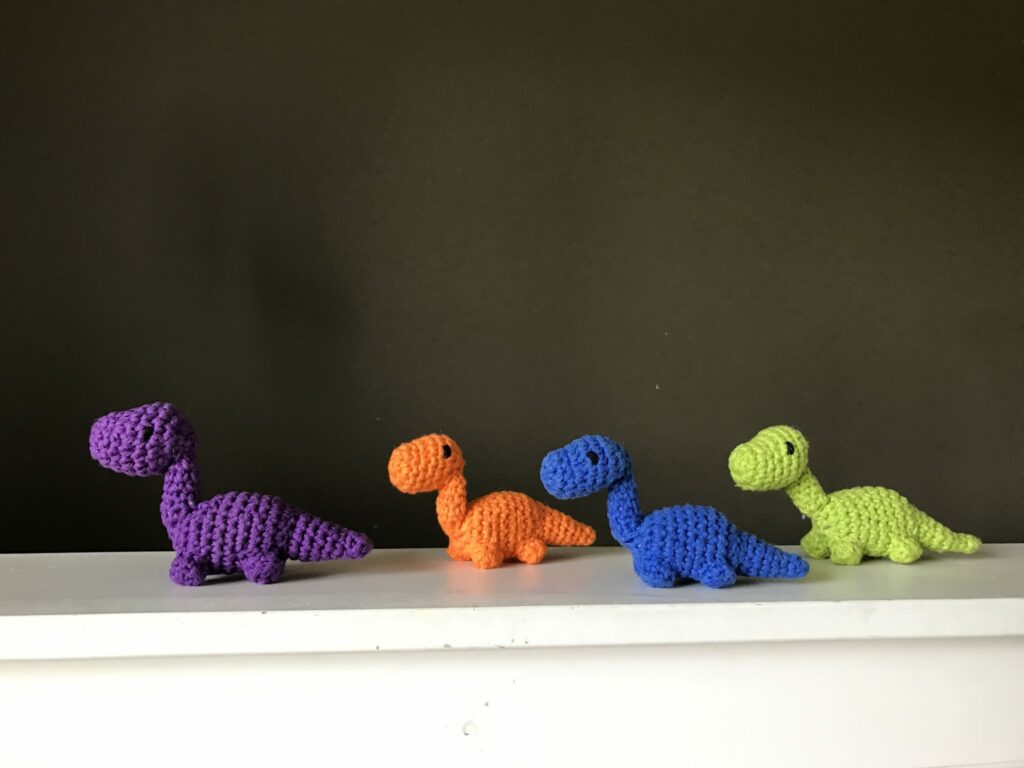 Fun crochet tiny dinosaur. This crochet animal pattern free is great for toys and keychains.