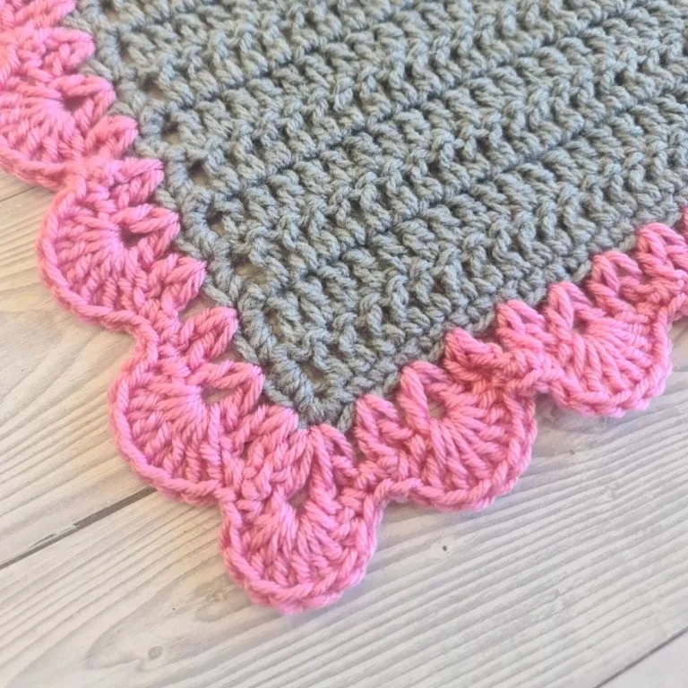 Crochet borders easy: sophisticated V-Stitch Shells Border with a scalloped edge.