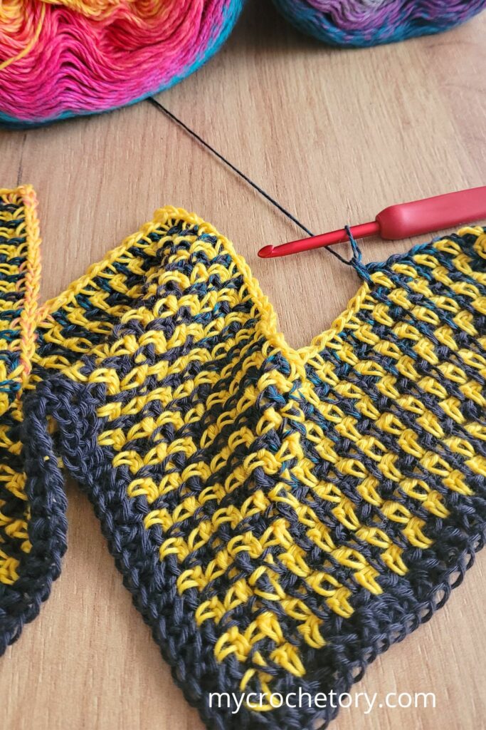 In-progress crochet stitches for the Flourish Linen Wrap, a beautiful free pattern crochet scarf in a chevron pattern.