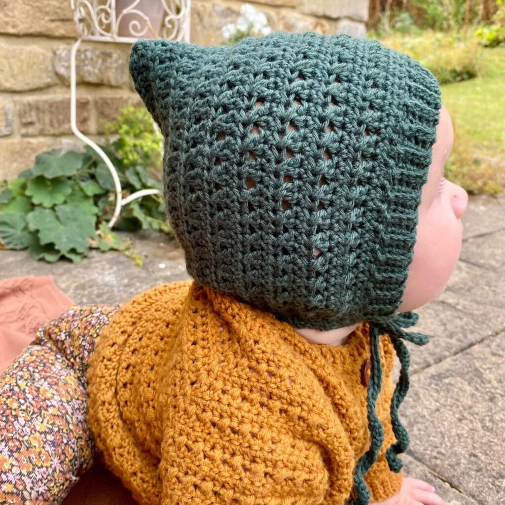 Stylish crochet baby bonnet, part of various infant crochet hat patterns.