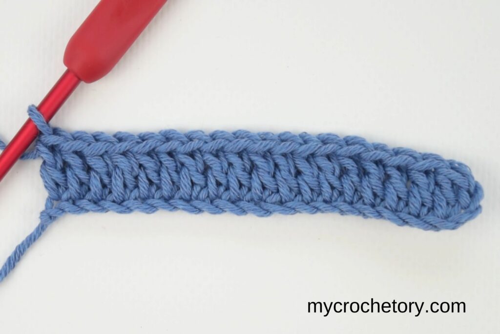 First row of double crochets for the waffle stitch crochet pattern.