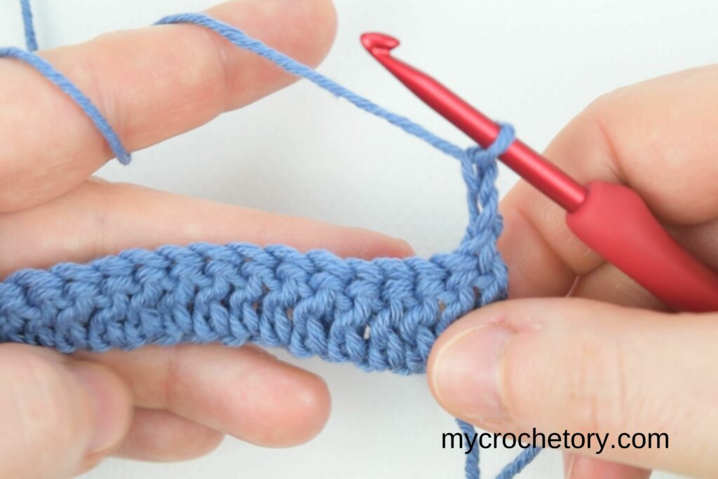 Beginning of the second row in the waffle stitch crochet pattern.