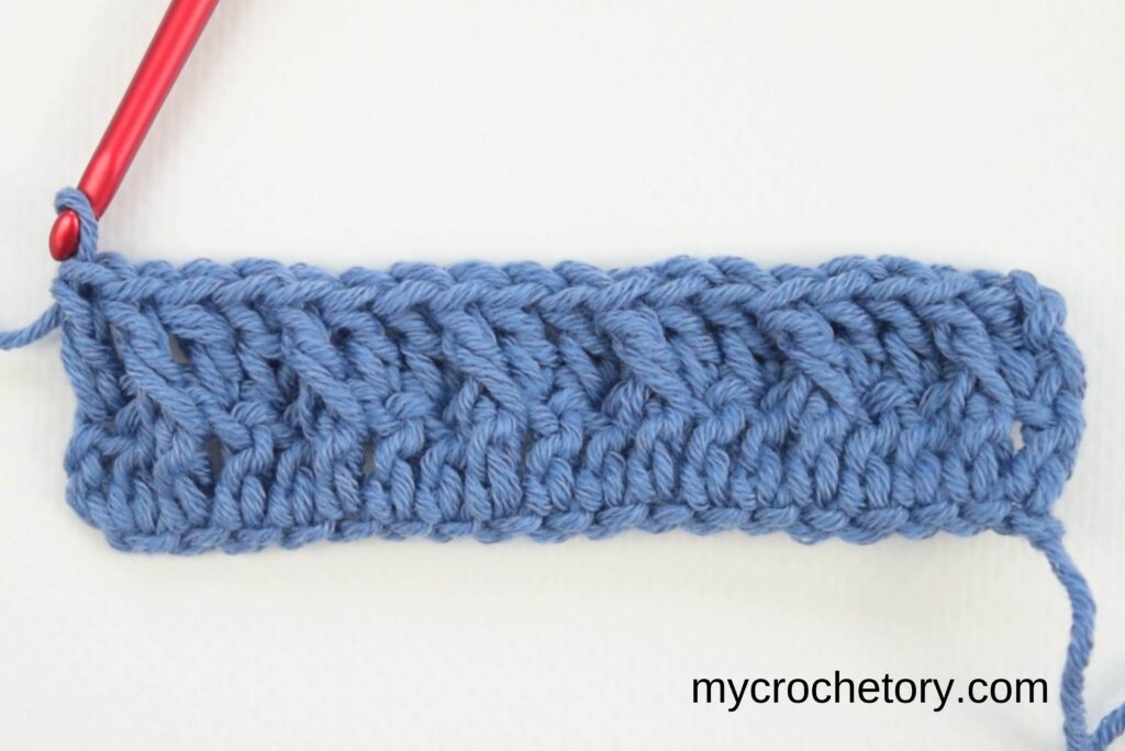 Finished second row of the waffle stitch crochet pattern.