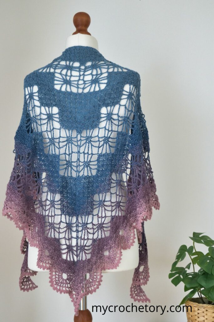 Back view of Arys Shawl on a mannequin featuring the Diagram Triangle Crochet Shawl Pattern