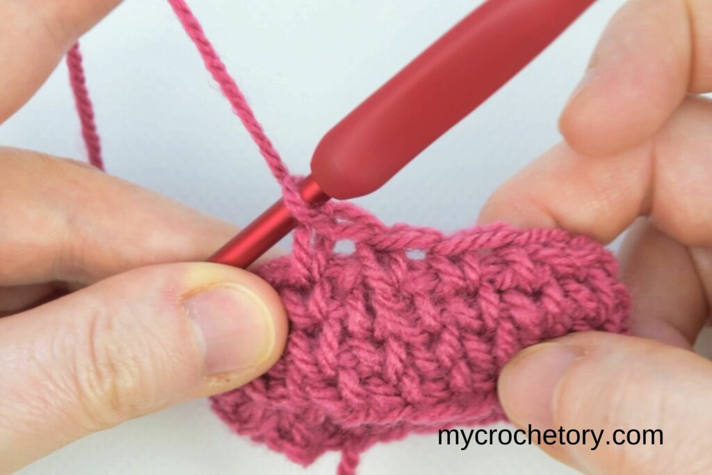 Final look of decrease method 2 with a neat finish in the crochet waistcoat stitch.
